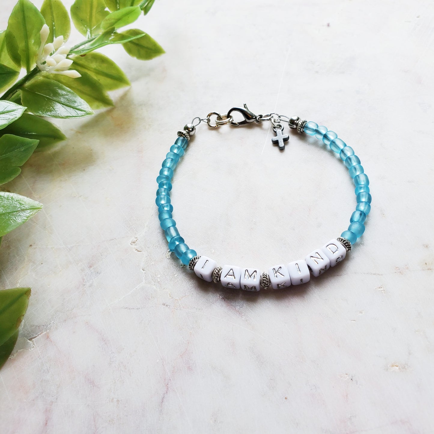 Aqua and silver single strand stackable Word bracelet