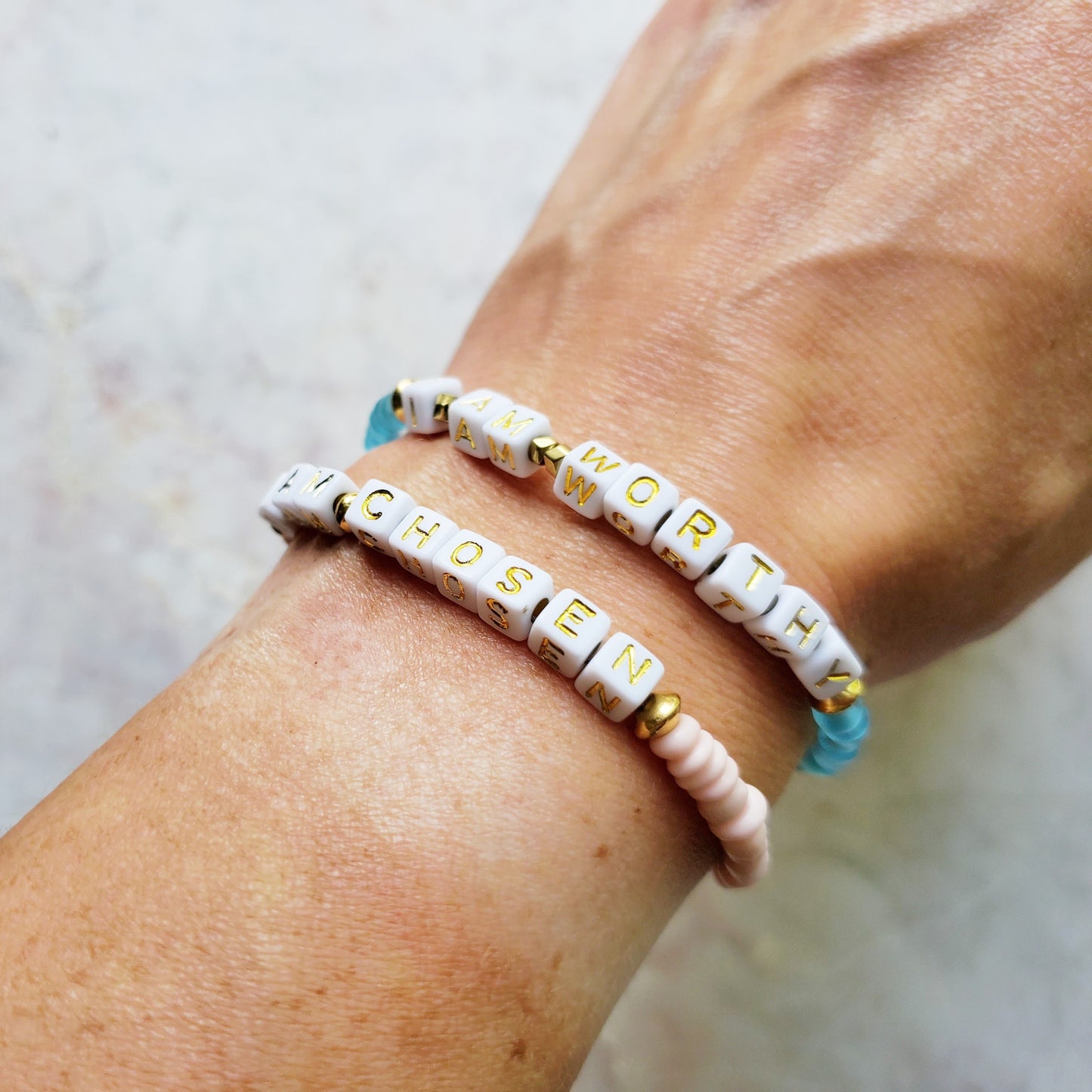 Pink and Gold Single Strand Word bracelet